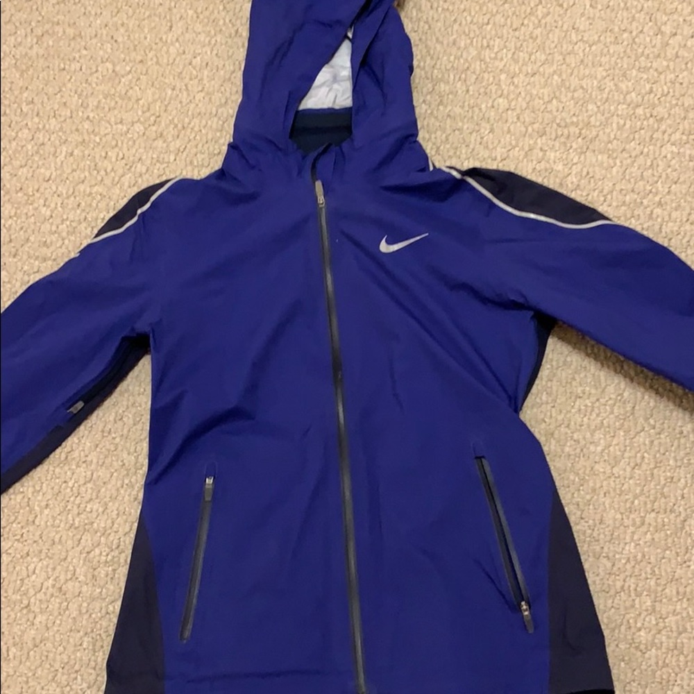 Blue Nike windbreaker